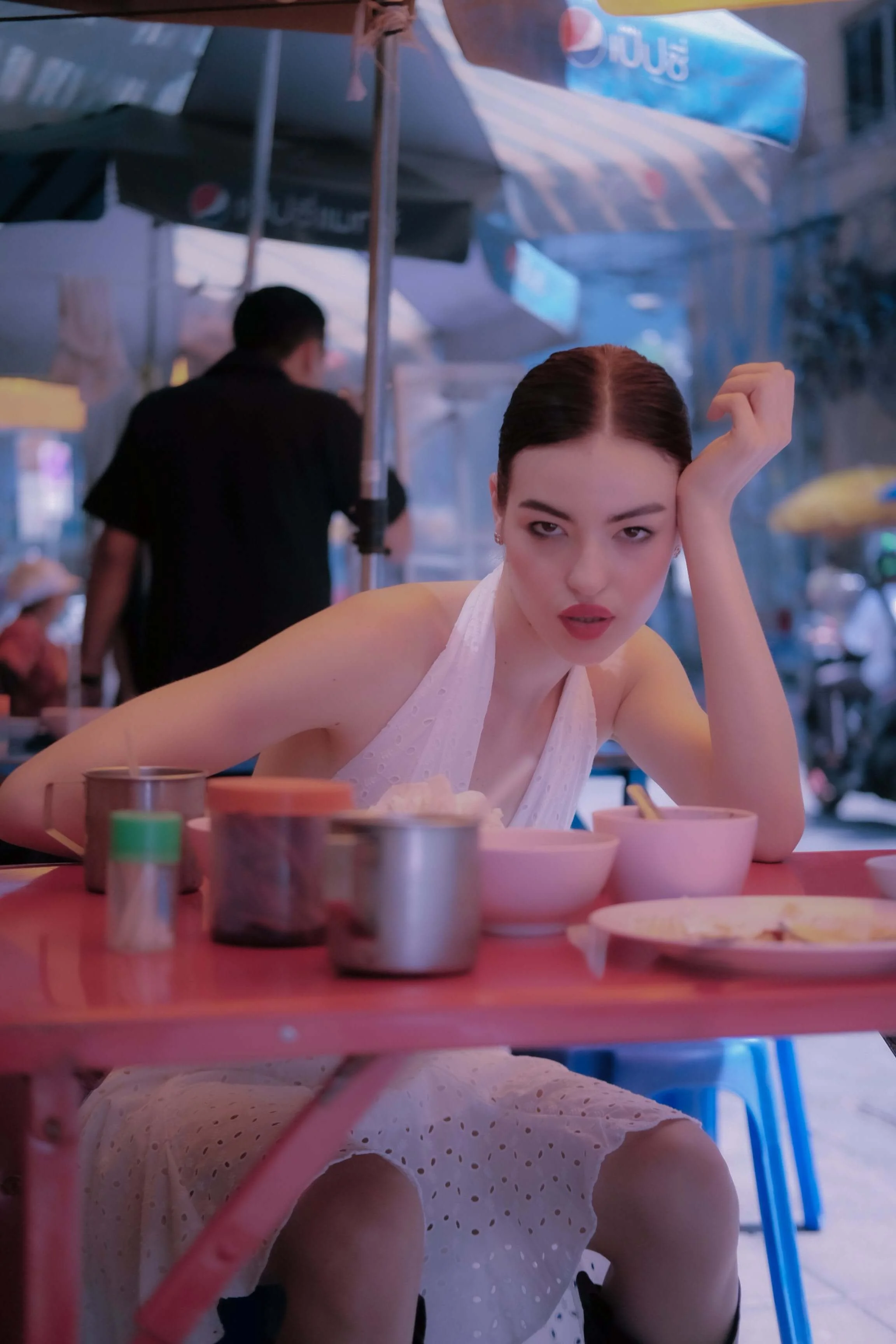 Girl sitting at a table